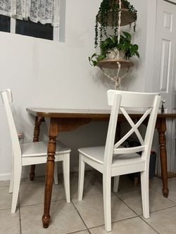 Wooden Table And 2 White Chairs