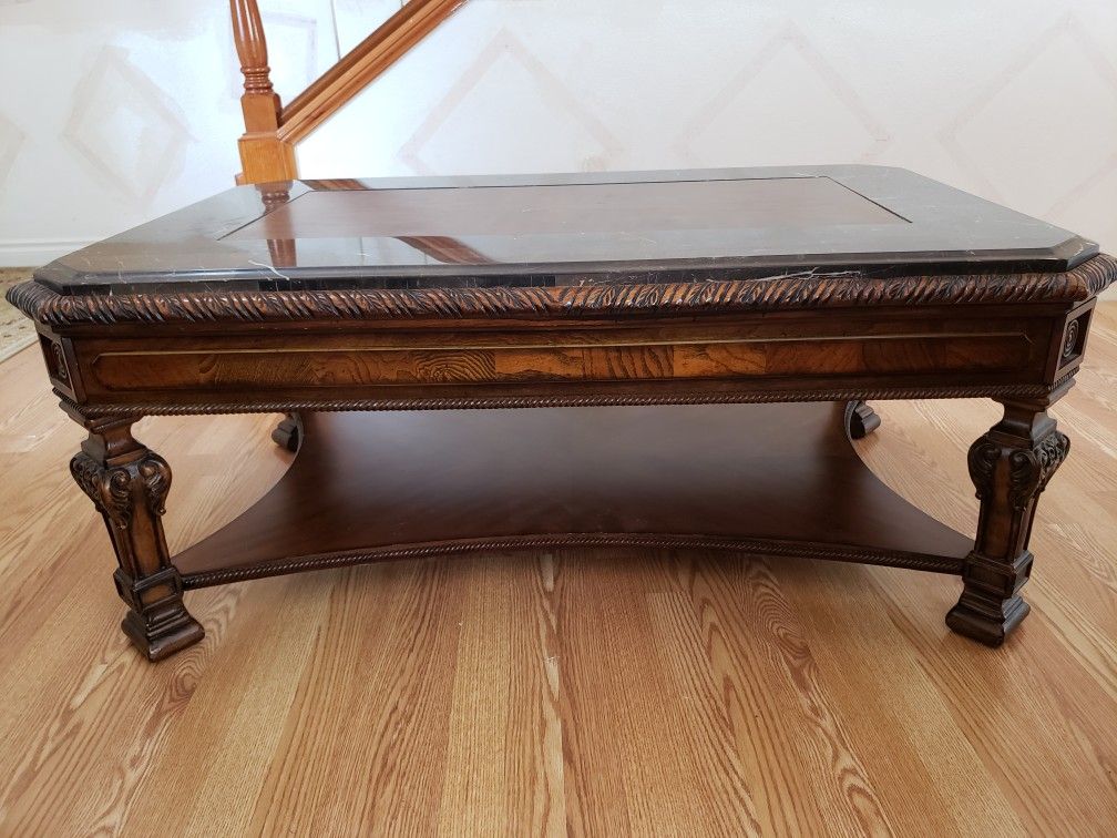 Beautiful wood coffee table with marble on top