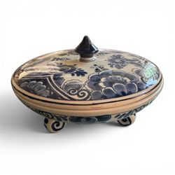 Delft  hand painted porcelain pottery  blue and white floral design lidd with a dark blue central knob. ed floral design with a dark blue central knob