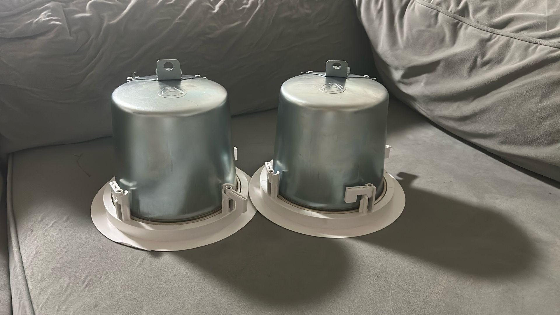 2 Atlas Sound FAP42T white speakers & 1 RCA Home Theater System receiver