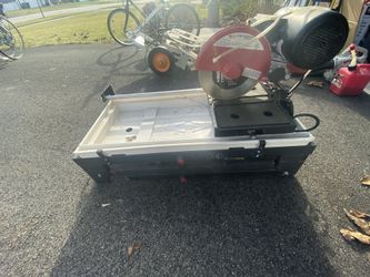 BARELY USED WET TILE SAW W/STAND
