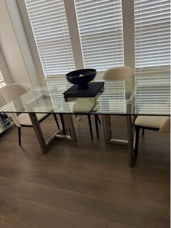 Contemporary glass dining table