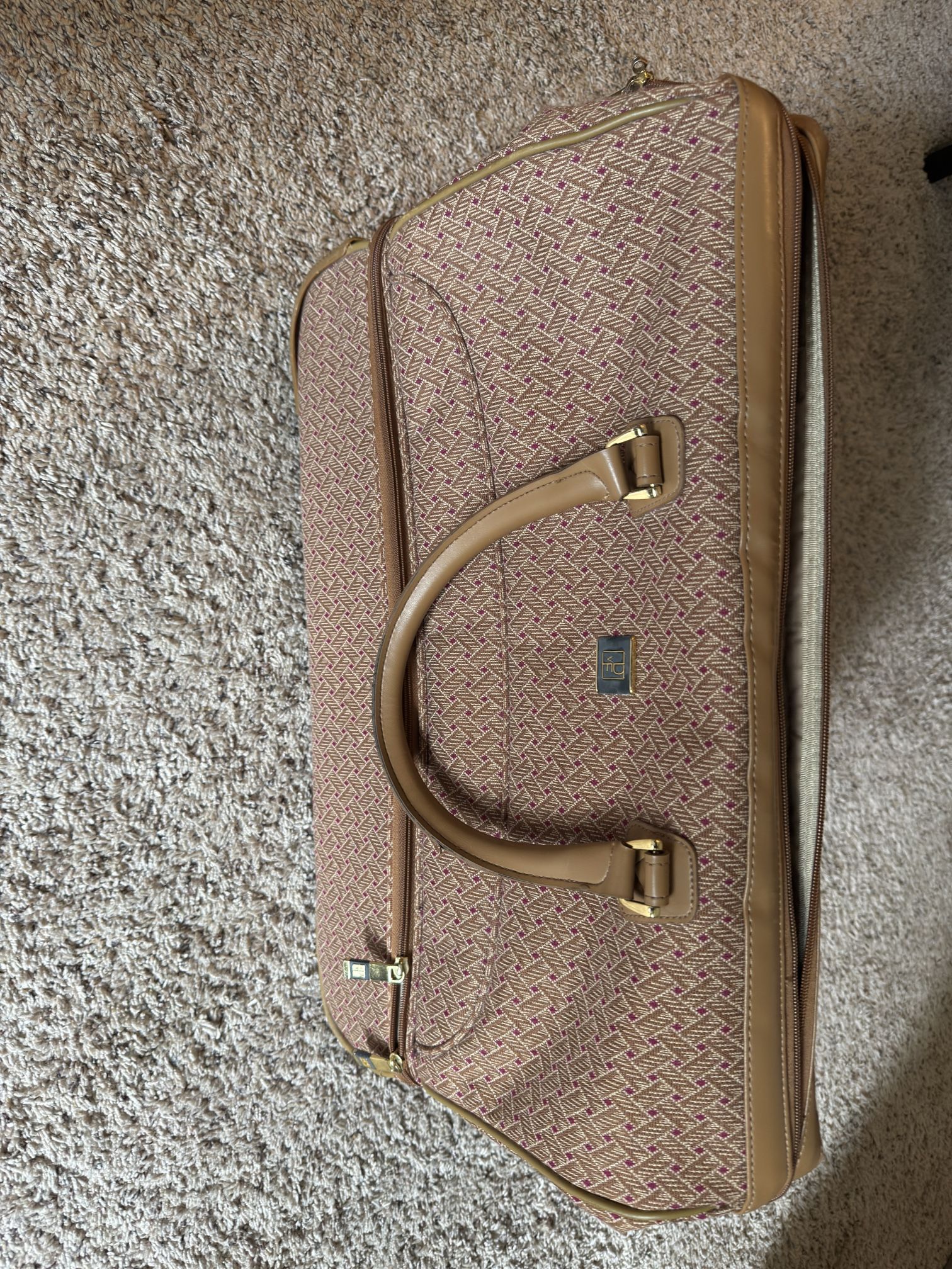 Diane Von Furstenberg Travel Bag (w/rollers)