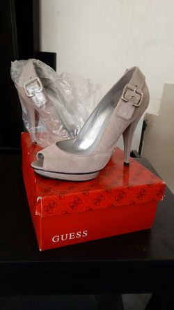 New never worn guess heels size 7