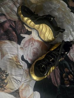 Metallic gold Nike Air Foamposite Pro sneakers in size 13.