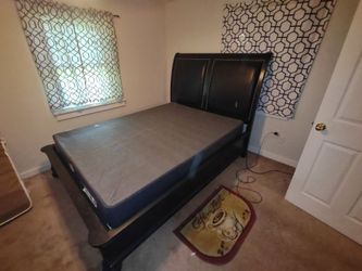 Black upholstered Queen bed set and box spring, plus matching dresser