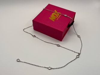 White gold finish lariat style necklace