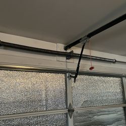 GARAGE DOOR SPRING REPLACEMENT 