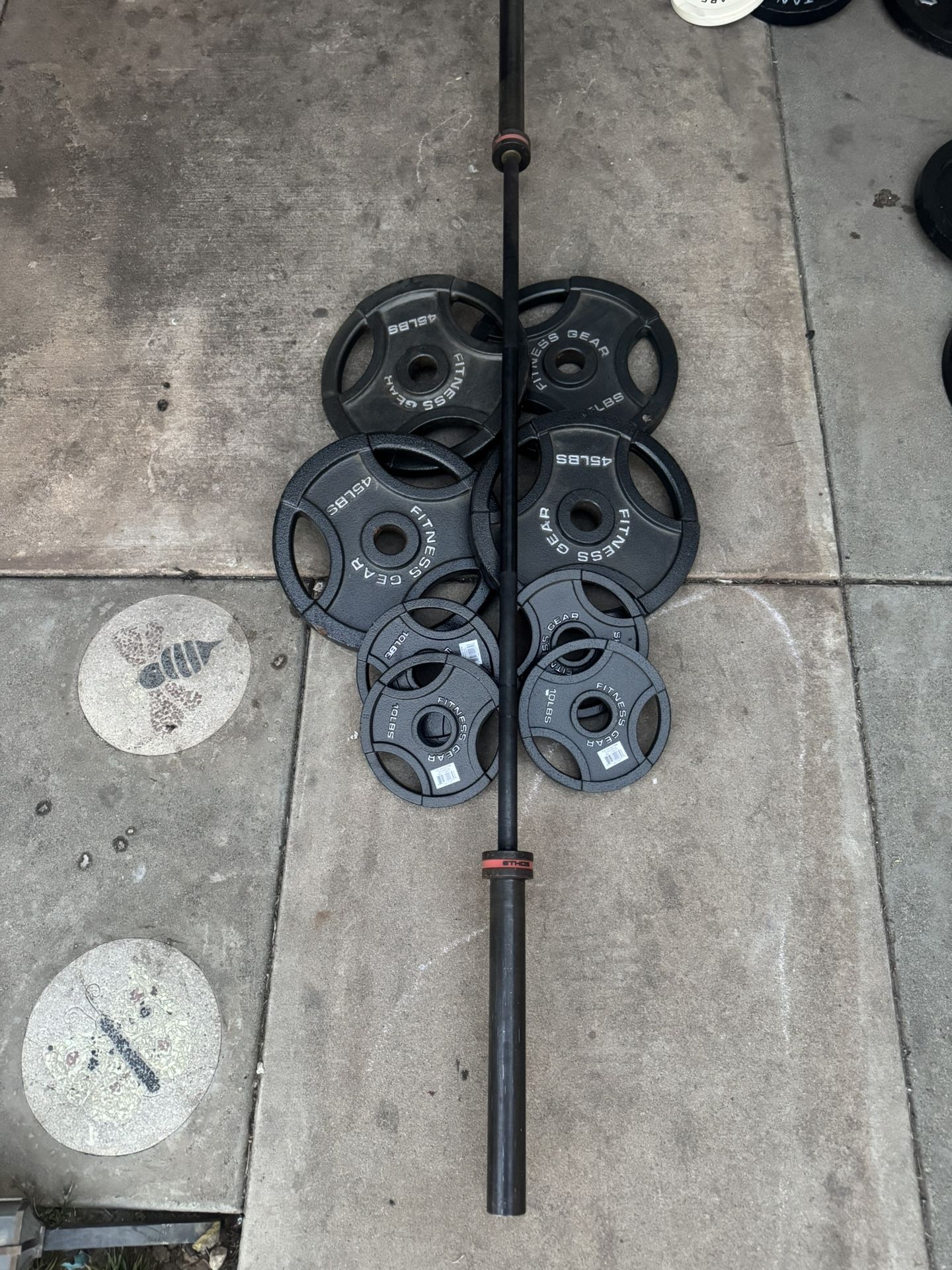 Olympic weights 220lbs total plus 7ft 45lbs bar ethos