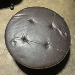 Brown round ottoman