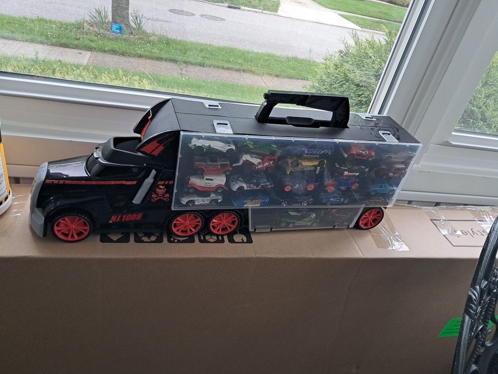 Hot wheel car and toll truck.