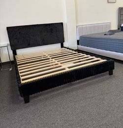 Queen platform bed frame with black corduroy