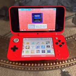 Pokeball 2DS XL, W/ Charger And Pokemon Sapphire Cart.