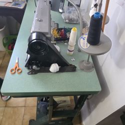 Sewing Machine 2 Of Them Or 1 Of Them Is A Proffesional$700.00