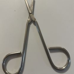 pair of littauer stitch scissors, often used for medical suture removal or as specialized embroidery thread snips.  Design: Features a characteristic 