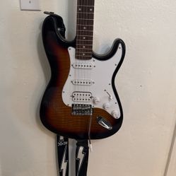 Glen Burton Guitar + Amp, Capo, Guitar Strap And Guitar Bag. 