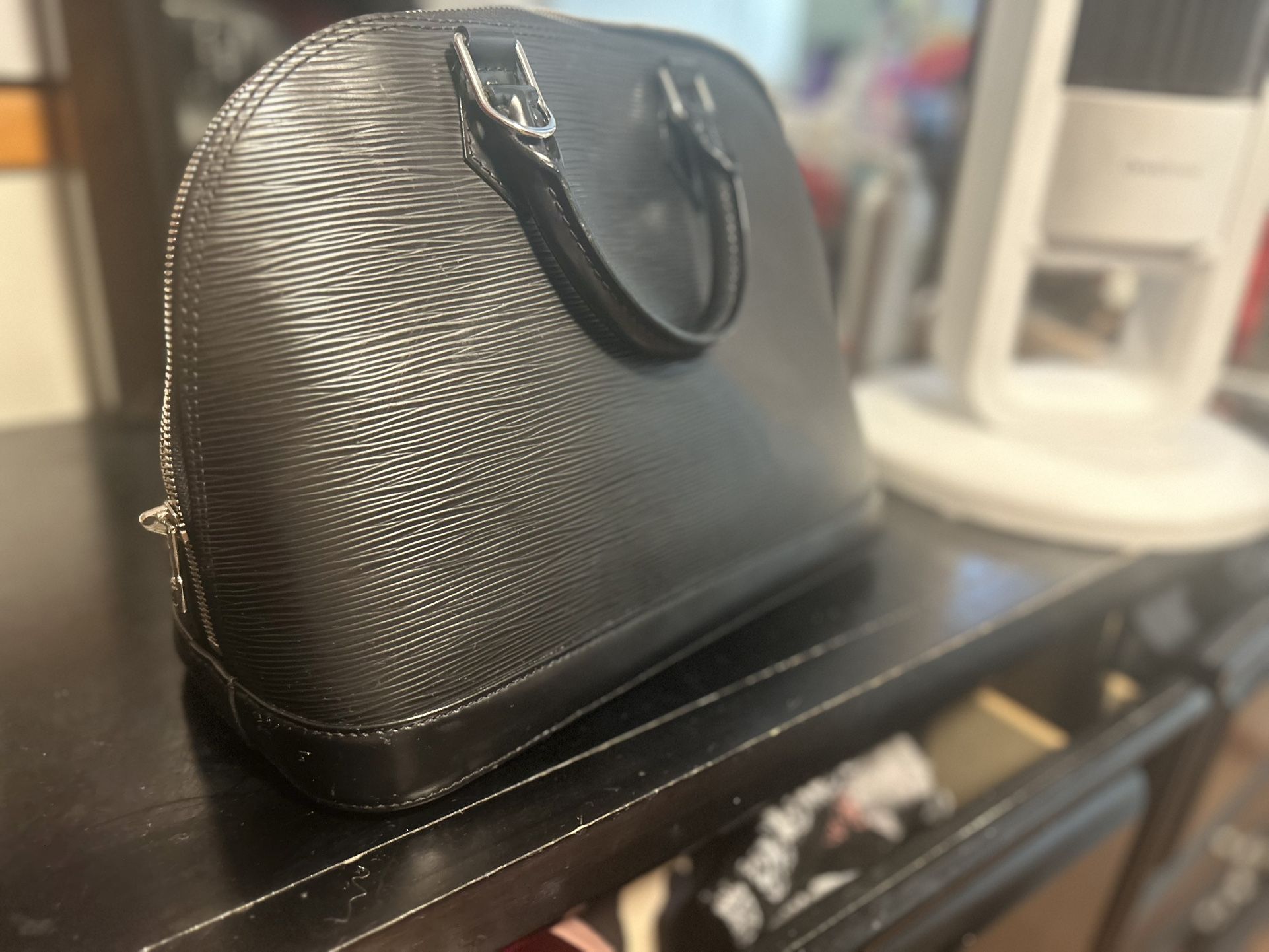 Louis Vuitton, Alma Pm Bag In Epi Leather . Black