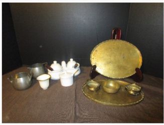 Antique brass and ceramic tea set.