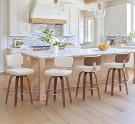 4X White 26” swivel faux leather barstools
