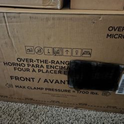 Brand New GE  Over The Range Microwave 