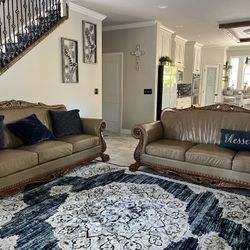Set Of Two Leather And Wood Couches 