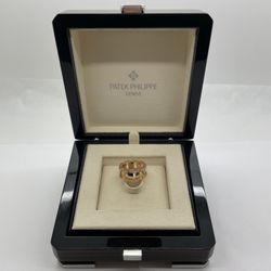 PATEK PHILIPPE 18KYG RING, SIZE 7, WITH NATURAL DIAMOND