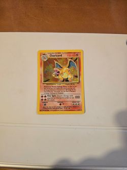 NM 1999 Pokemon Base Set Charizard #4/102 Unlimited Holo
