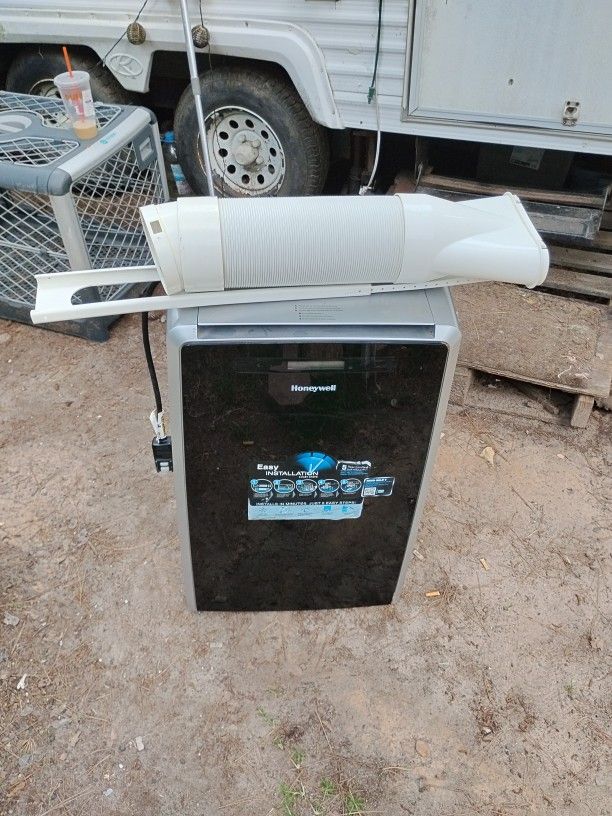 Honeywell MM14CHCS Portable Air Conditioner - 14,000 BTU (Cooling & Heating) - Black/Silver**
🔥 **Year-round comfort in one machine!**