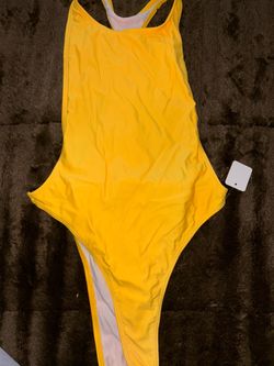 Sexy Yellow bathing suit with black snaps on sides
