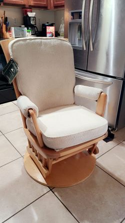 Like new spotless clean rocking chair /  glider works no damages asking $70 cash cushions come off for easy cleaning must pick up Broadway and apache 