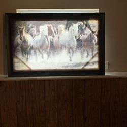 Picture frame with horses