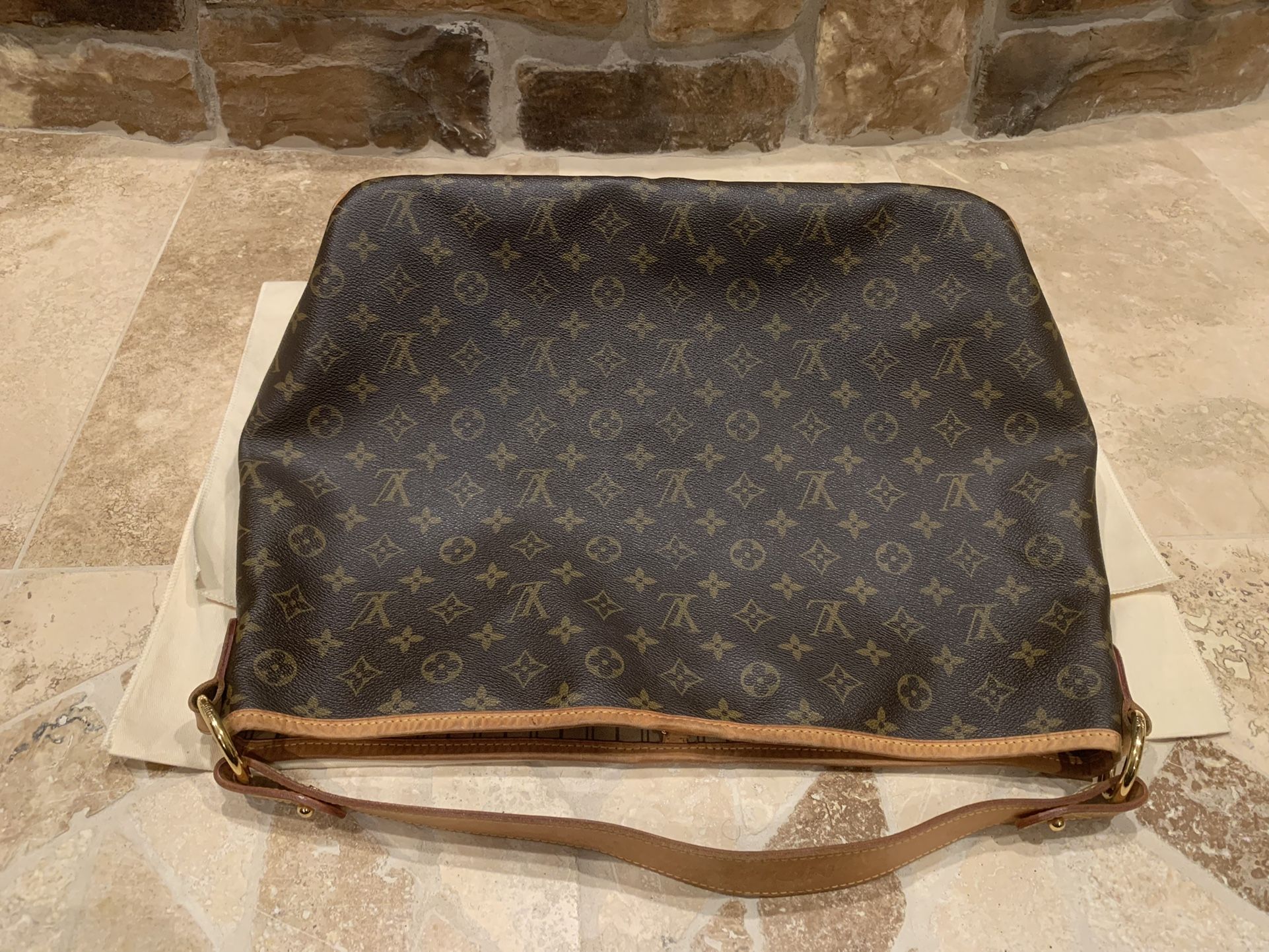 Louis Vuitton, 'Delightful' bag. - Bukowskis