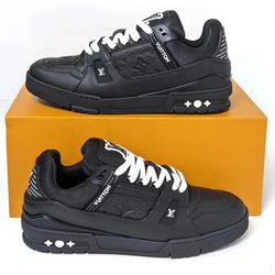 Louis Vuitton LV Trainer in a black colorway, featuring Monogram-embossed