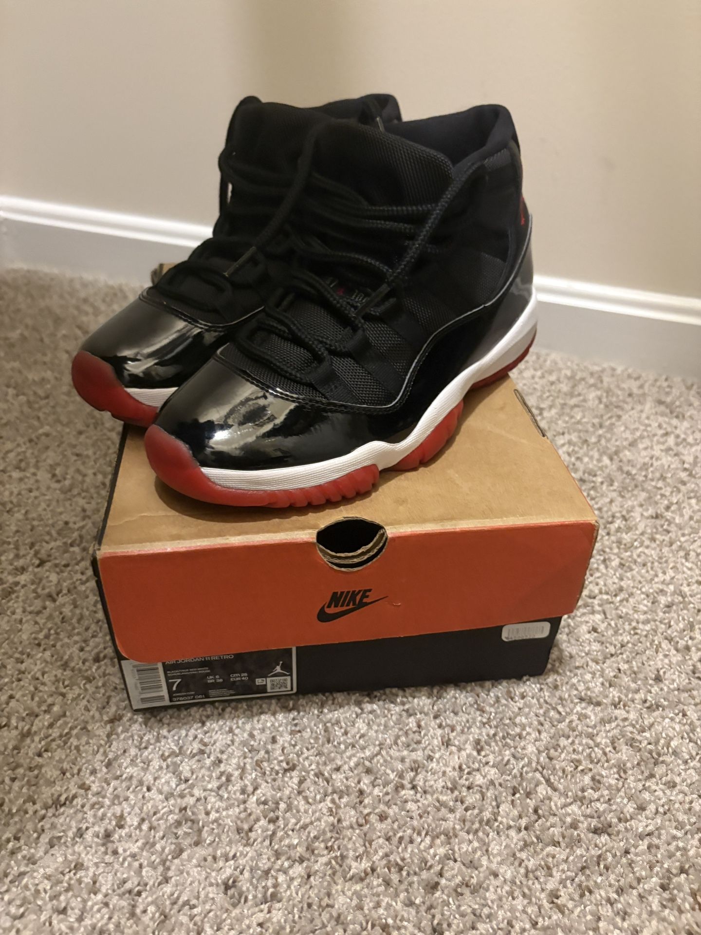 Air Jordan Bred 11s, Size 7 Mens