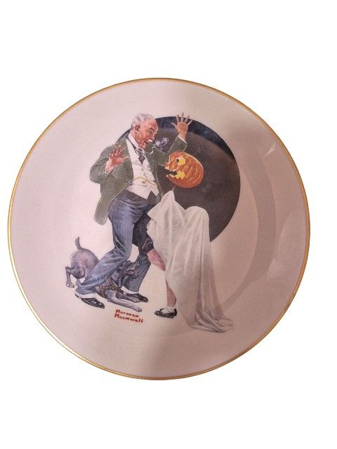 Add a taste of vintage Halloween charm to your collection with this fine porcelain collector’s plate featuring Norman Rockwell’s “Trick or Treat.” Pro