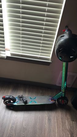 Electric scooter comes with a charger and a helmet Electric scooter comes with a charger and a helmet