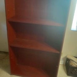 Solid very sturdy cedar colored shelf. Very heavy, will take 2 people to carry it.Solid very sturdy cedar colored shelf. Very heavy, will take 2 peopl