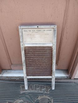Authentic antique mini washboard.