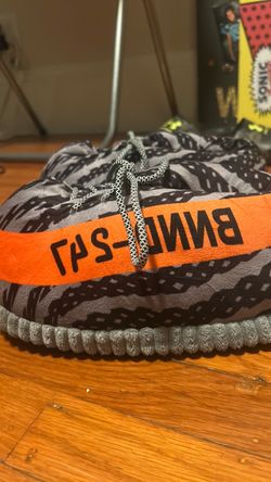 House slipper’s orange,black, and grey
