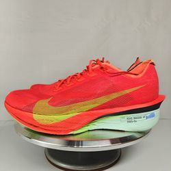 Size 11 US Men's Nike ZoomX Vaporfly Next% 4 running shoes in the Bright Crimson/Mint