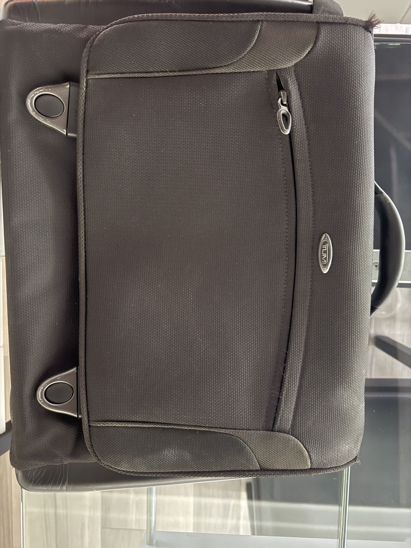 Tumi