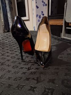 Louboutin Black Patent Leather Pumps