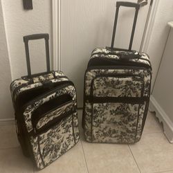 Matching rolling luggage set European print