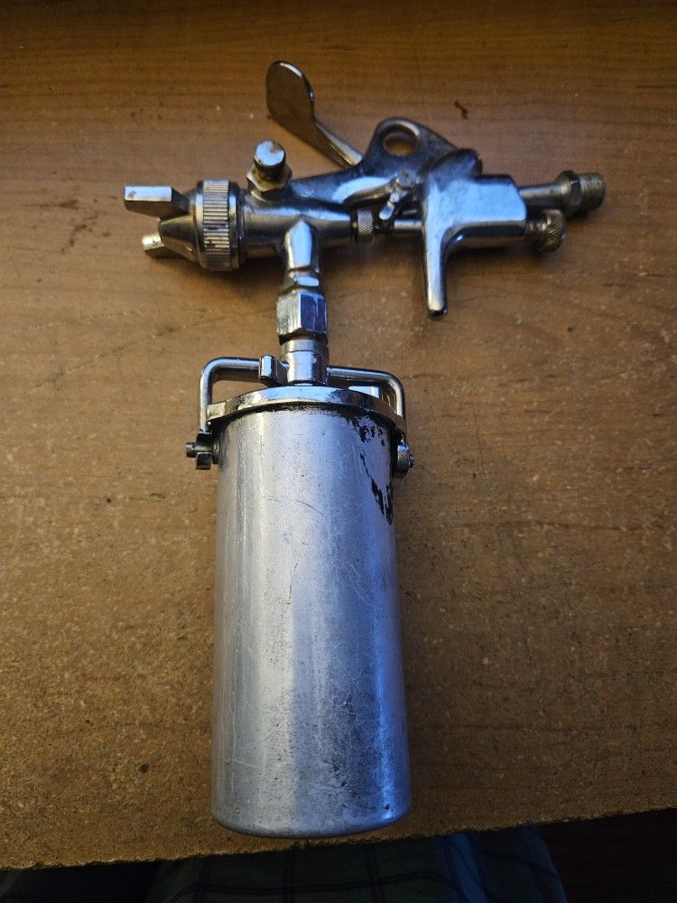 Paint Gun And Wood Wheel