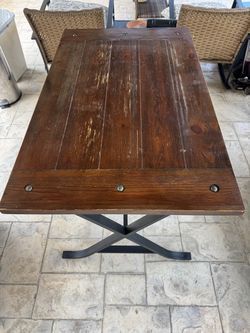 Wood table with iron legs
