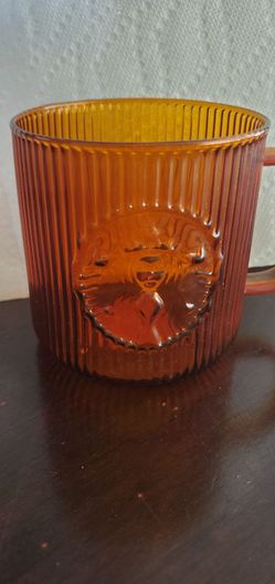 Amber Glass Mug with Embossed Animal Face