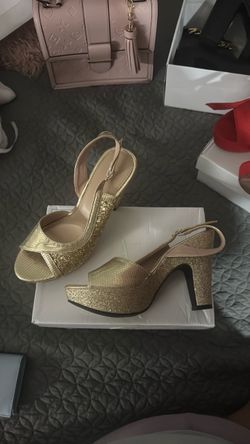 Gold high heels
