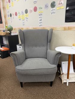 Grey wingback chair