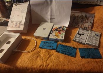 Handheld printer for your smart phone works great comes with original box.