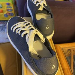 Olukai women’s lace-up sneakers